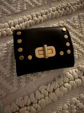 Michael Kors black and gold studded wallet. In awesome condition-supple leather